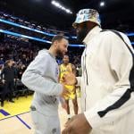 Stephen Curry greets LeBron James after their preseason game on October 18, 2024 at the Chase Center in San Francisco, CA.