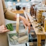 A woman shops at a zero-waste store.