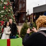  Visitors pose for a photo at the Christkindlmarket in Bethlehem, Pennsylvania.