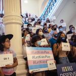 LGBTQ rights supporters gather at the Texas State Capitol to protest state Republican-led efforts to pass legislation that would restrict the participation of transgender student athletes in 2021.