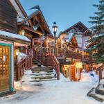 Streets decorated for Christmas in Breckenridge, Colorado, at night.