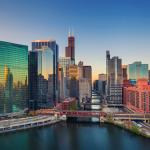 A cityscape view of Chicago's downtown at sunrise.