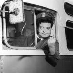 Actor Jackie Gleason as Ralph Kramden posing on his bus in a still from the 1950s television series 'The Honeymooners.'