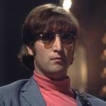 John Lennon of The Beatles wearing sunglasses in 1966.