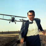 American actor Cary Grant on the set of "North by Northwest", directed by Alfred Hitchcock