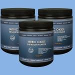 Three jars of nitric oxide supplement powder in blue background.