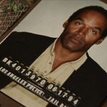 A photograph of O.J. Simpson's mugshot in a scene from 'American Manhunt: O.J. Simpson'