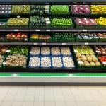 The fresh produce shelf on a supermarket.