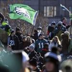 Eagles fans celebrate during a Super Bowl championship parade in Philadelphia.