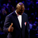 Michael Jordan reacts after being introduced as part of the NBA 75th Anniversary Team during the 2022 NBA All-Star Game, February 2022.