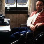 James Caan in a wheelchair in a scene from the film 'Misery' (1990)