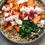 A plate of quinoa, feta cheese and sweet potatoes salad.