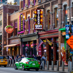 Famous neon signs of blues clubs on Beale street in downtown Nashville