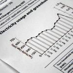 A closer view of the graphs and data in an electricity bill document.