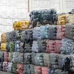 Heaps of pressed textiles waiting for recycling at Renewcell.