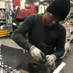 A student working at apprenticeship at Lincoln Electric in Cleveland, Ohio.