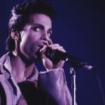 Prince performs on stage at Wembley Arena in London in August 1986.