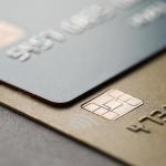 A black and gold credit card as a concept of high limit business credit cards.