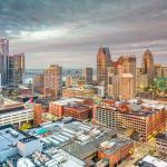 A view of Detroit, Michigan's skyline during dusk.