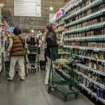 Consumers looking at the tea, coffee and spices aisle in a supermarket in New York.
