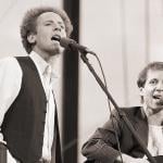 Art Garfunkel and Paul Simon perform for more than 500,000 fans in Central Park.