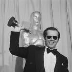 Actor Jack Nicholson waves his Best Actor Oscar for 'One Flew Over the Cuckoo's Nest' at the 48th Annual Academy Awards.