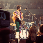 American rock guitarist and singer Jimi Hendrix (1942-1970) performs live on stage playing a black Fender Stratocaster guitar with drummer Mitch Mitchell and bassist Noel Redding of The Jimi Hendrix Experience at the Royal Albert Hall in London on 24th February 1969. 