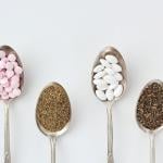 Spoonfuls of supplements such as chamomile, magnesium pills, vitamin B complex pills and lemon balm.