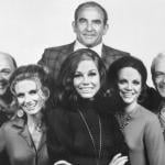 The cast of 'The Mary Tyler Moore Show,' from left to right: Gavin MacLeod, Cloris Leachman, Mary Tyler Moore, Valerie Harper, and Ted Knight. At top, is Ed Asner.