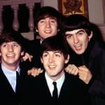The Beatles pose for a portrait in suits, circa 1964. (L–R) Ringo Starr, John Lennon, Paul McCartney, and George Harrison.