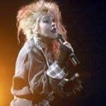 Cyndi Lauper performing on stage in 1980.