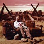 American actor Burgess Meredith (1907 - 1997) stars in the 'Time Enough at Last' episode of the television program, 'The Twilight Zone', 1959. He plays Henry Bemis, the last man left alive after a nuclear explosion.