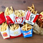 Overhead shot of french fries from 9 different fast food restaurants