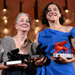 Kathleen Chalfant and Sarah Friedland pose with awards at the 81st Venice Film Festival.