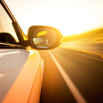 A car speeding down the highway.