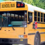 A close-up of a yellow school bus.