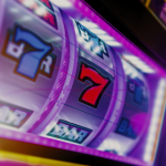  A close up of a slot machine with the number 7 on it.