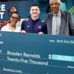 Desi Okeke, Brayden Reynolds, and Julius Erving are seen at March Madness Fan Fest.