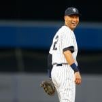 Derek Jeter #2 of the New York Yankees smiles during a game.