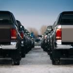 A row of parked trucks.