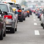 Cars on highway in traffic jam.