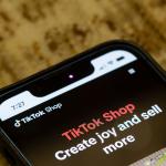Webpage of TikTok Shop is seen on its corporate website on an iPhone.