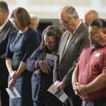 Cochise County Supervisor Peggy Judd, center, bows her head in prayer during the inauguration of the Southern Arizona Regional Border Operations Center in Sierra Vista, Arizona.
