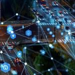 Cars on road during nighttime illustrated with tracking technologies.