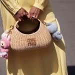 Zufi Alexander's straw Miu Miu bag attached with Labubu charms.