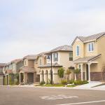 A row of double story suburban homes.