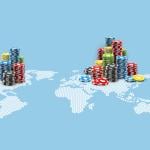 Colored casino chips on an illustration of the world map.
