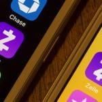Zelle mobile app icons on smartphones.