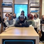 Group phot of mentors and mentees at H.D. Woodson’s Attendance Pep Squad who met with community partners to learn how to build a stronger school culture. 