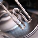 Electric heater from washing machine aged by hard water.
